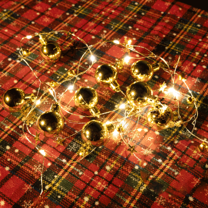 3AA baterijų girliandos Žvaigždės Rutuliukai auksinės, šiltai balta, 2m