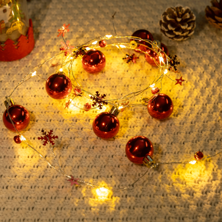 3AA baterijų girliandos Žvaigždės Rutuliukai raudonos, šiltai balta, 2m